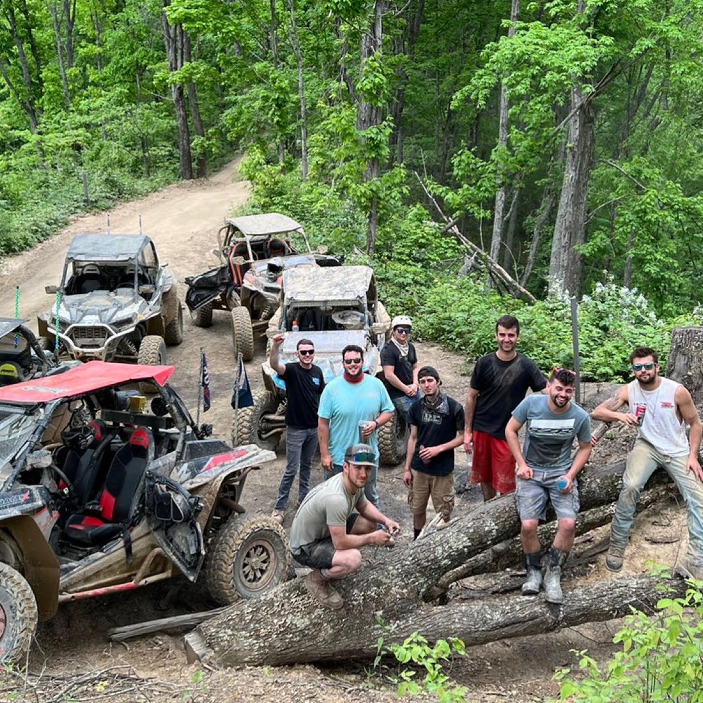 FeudLine riders stopped with side-by-sides on the trail