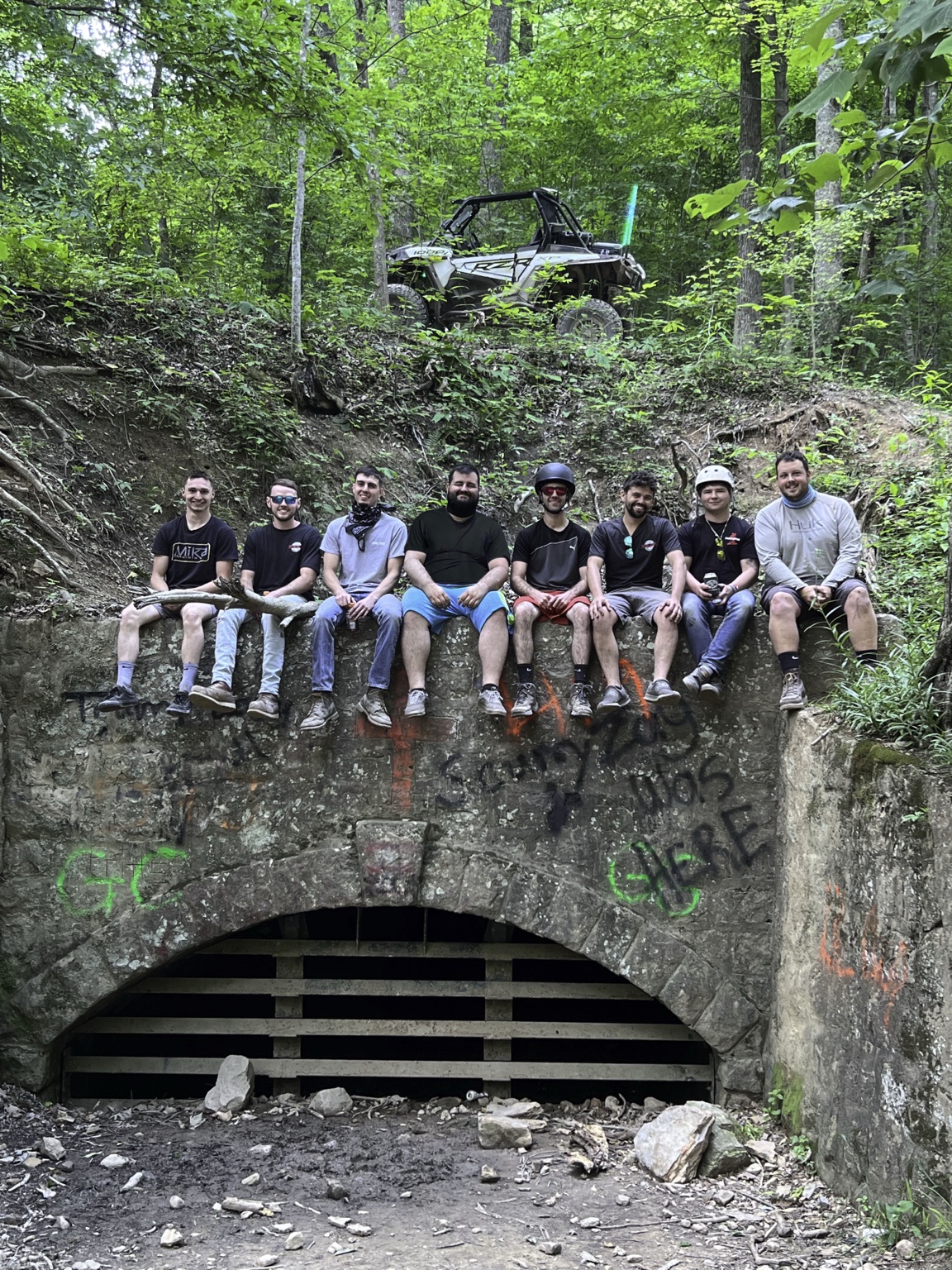 Trail riders at an old structure in Southern West Virginia