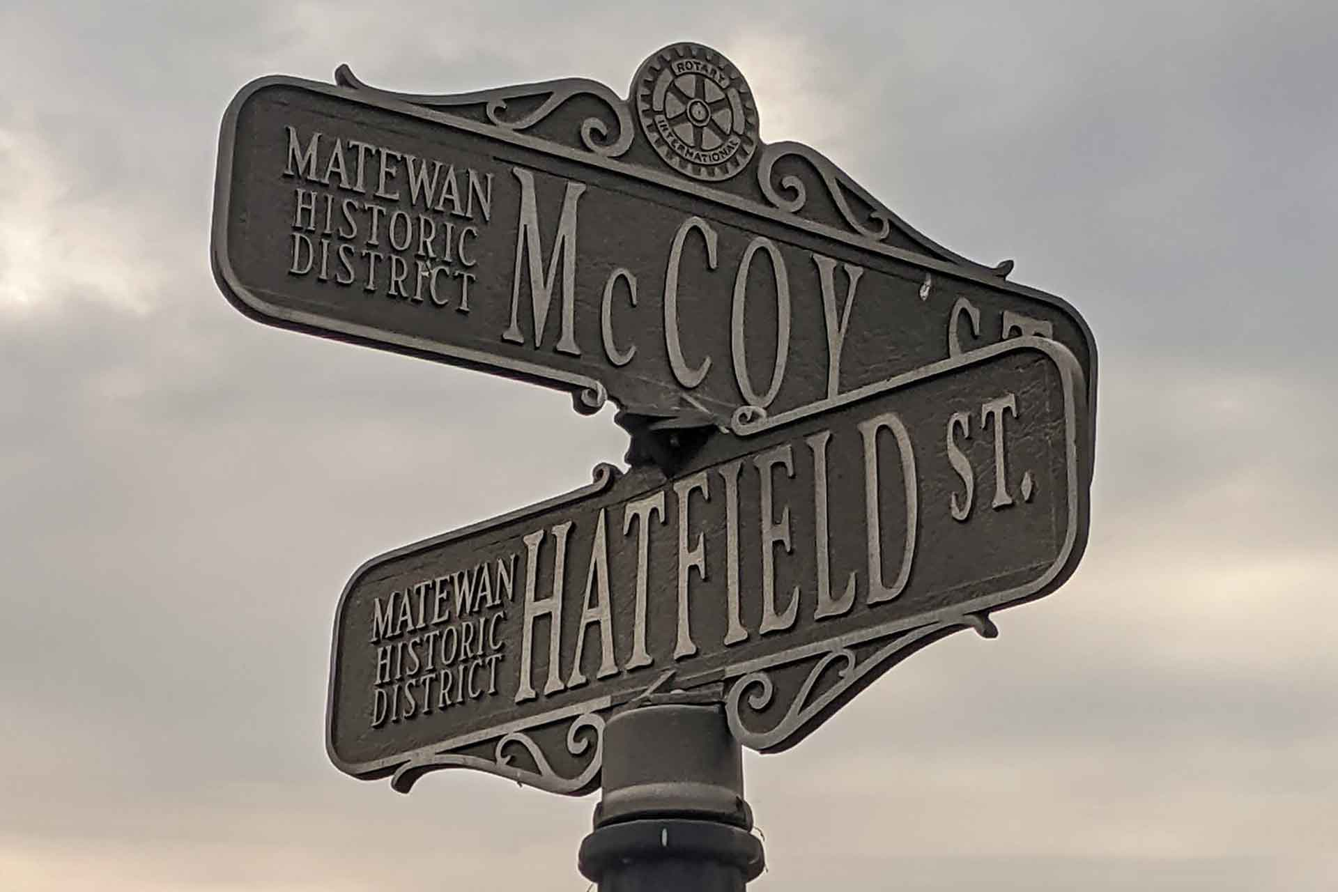 Hatfield Street and McCoy Street signs in Matewan Historic District loading=