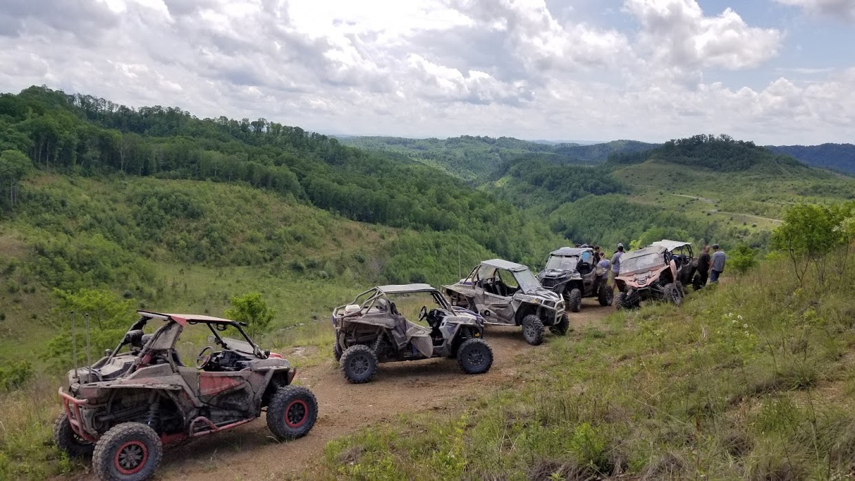 Side-by-sides overlooking the West Virginia mountains on a Hatfield-McCoy Trails ride near Matewan